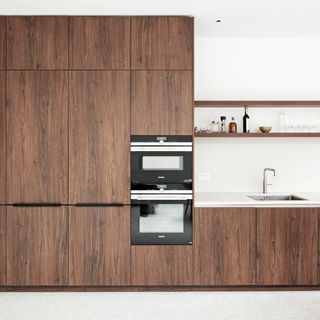 dark wood contemporary kitchen cabinetry