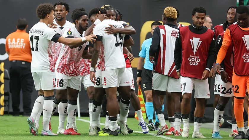 Daniel Phillips #8 and Dante Sealy #15 of Trinidad and Tobago hug after Sealy&#039;s goal in the first half during a CONCACAF Gold Cup Group D match between Saudi Arabia and Trinidad and Tobago at Allegiant Stadium on June 22, 2025 in Las Vegas, Nevada. 