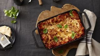 STAUB Black Cast Iron Dish in black with lasagne