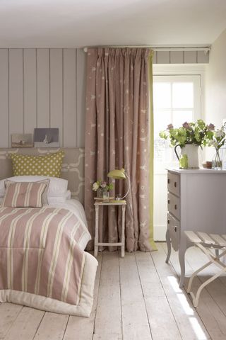 Bedroom with pink curtains by Vanessa Arbuthnott