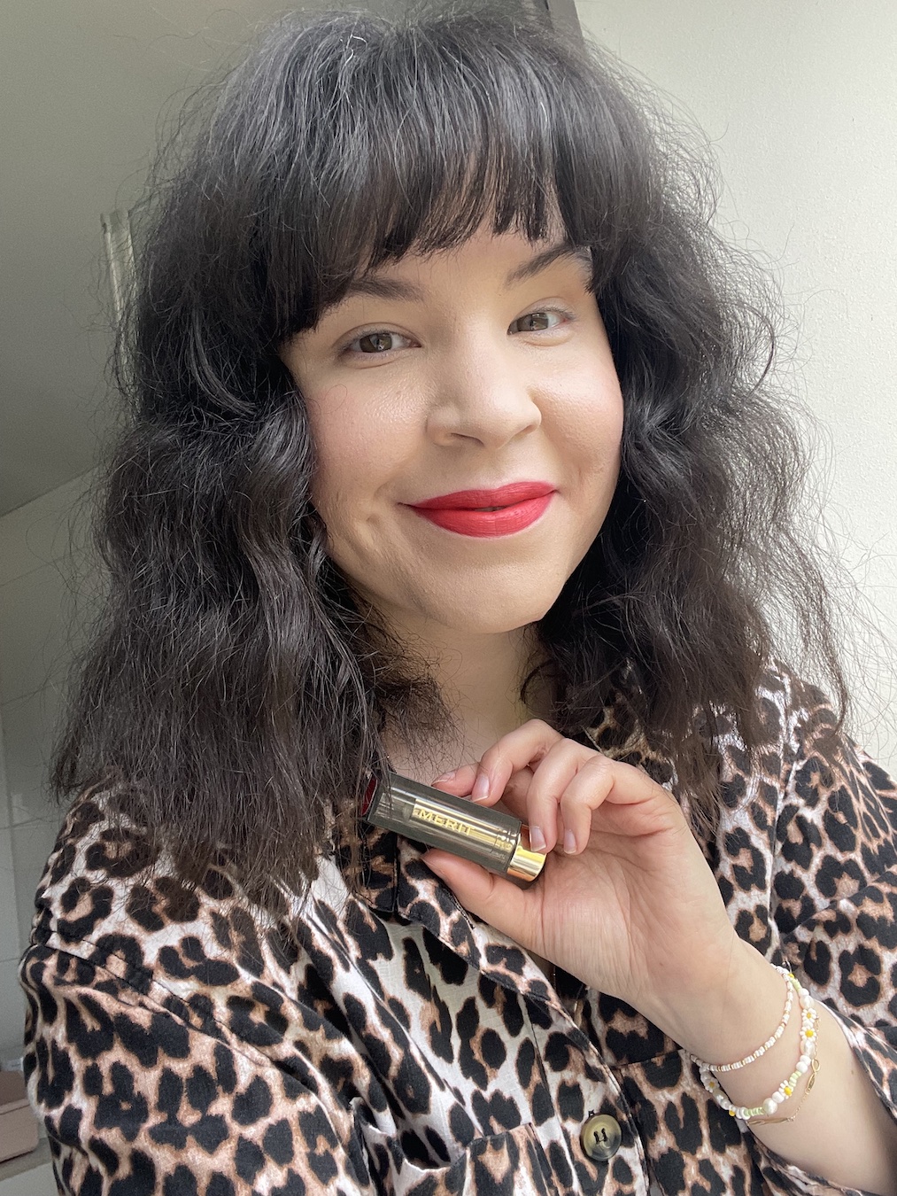 Mica Ricketts wearing Merit matte lipstick