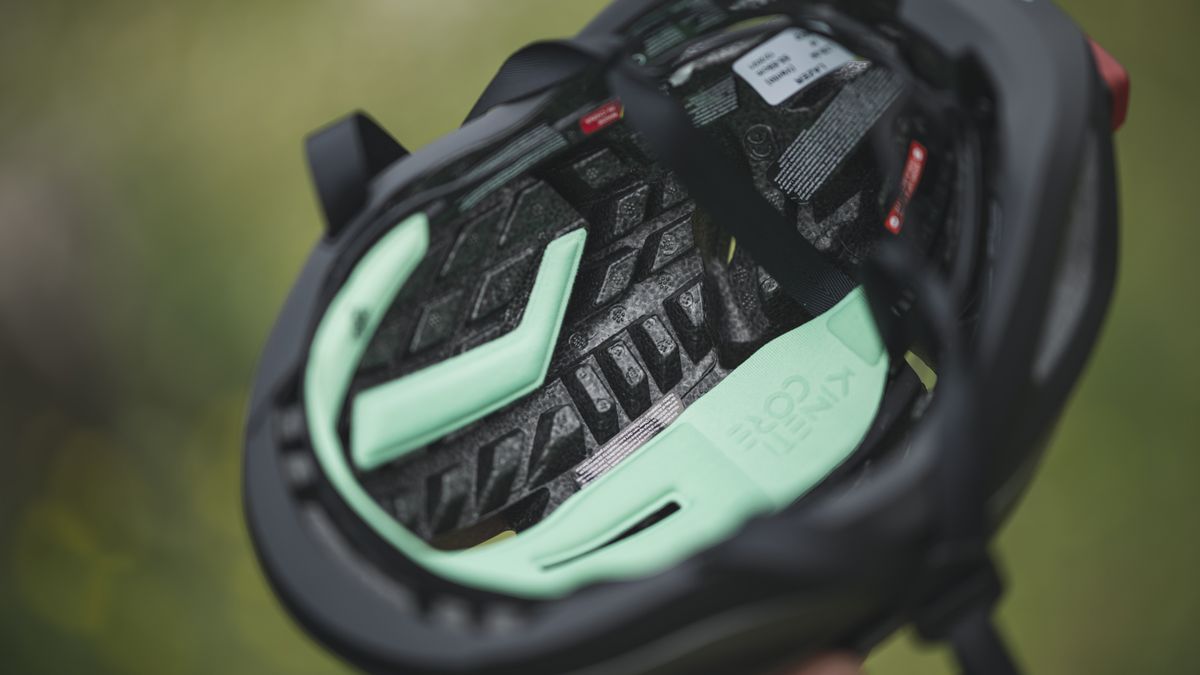 A detail shot of the inside of a Lazer Vento helmet, showing the KinetiCore construction