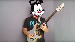 Animaniac with an electric guitar