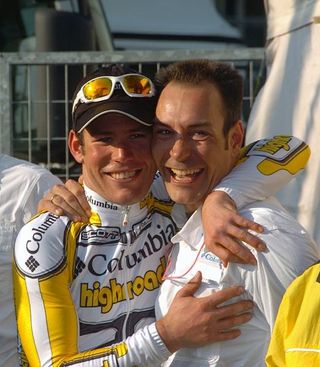 Columbia's Mark Cavendish after his Milan-Sanremo win, with coach Erik Zabel, himself a four-time winner.