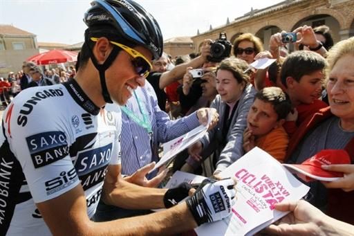2010 Vuelta a Castilla y Leon champion Alberto Contador (Saxo Bank Sungard) signs autographs prior to the final stage.