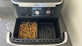 air fryer with cooked pasta chips