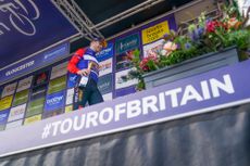 Wout van aert on the podium of the 2023 Tour of Britain