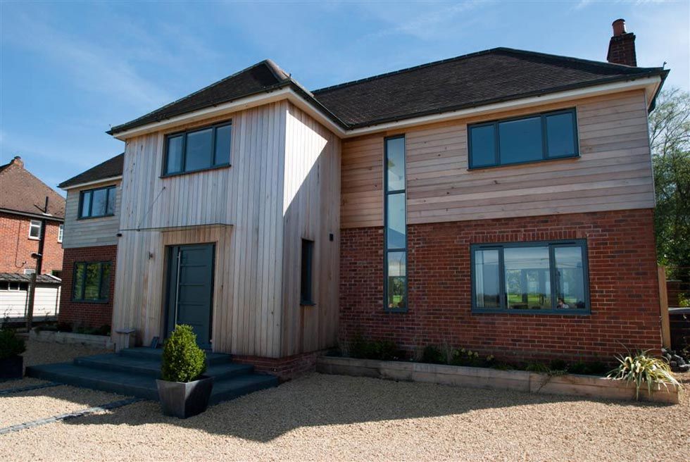 brick and wood clad remodelled house