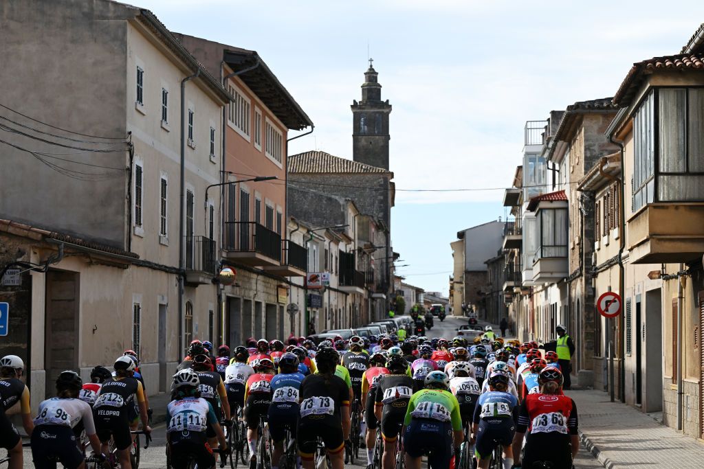 BINISSALEM SPAIN JANUARY 27 A general view of the peloton passing through a village landscape during the 2nd Challenge Femenino Ciclista Mallorca 2025 Trofeo Binissalem Puerto de Andratx a 1075km One day race from Binissalem to Port dAndratx 168m on January 27 2025 in Binissalem Spain Photo by Tim de WaeleGetty Images