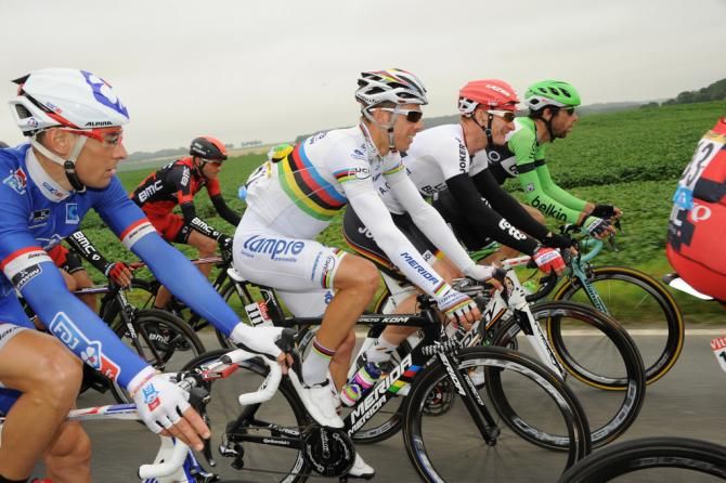 Rui Costa and Andre Greipel smiling in the peloton
