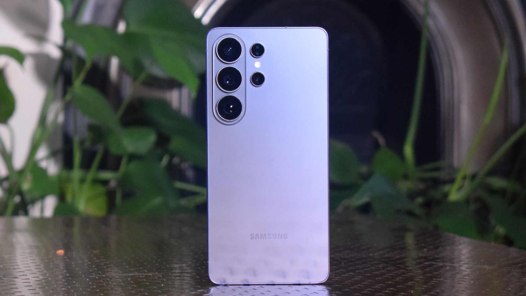 The Samsung Galaxy S26 Ultra standing up on a table, showing its rear.