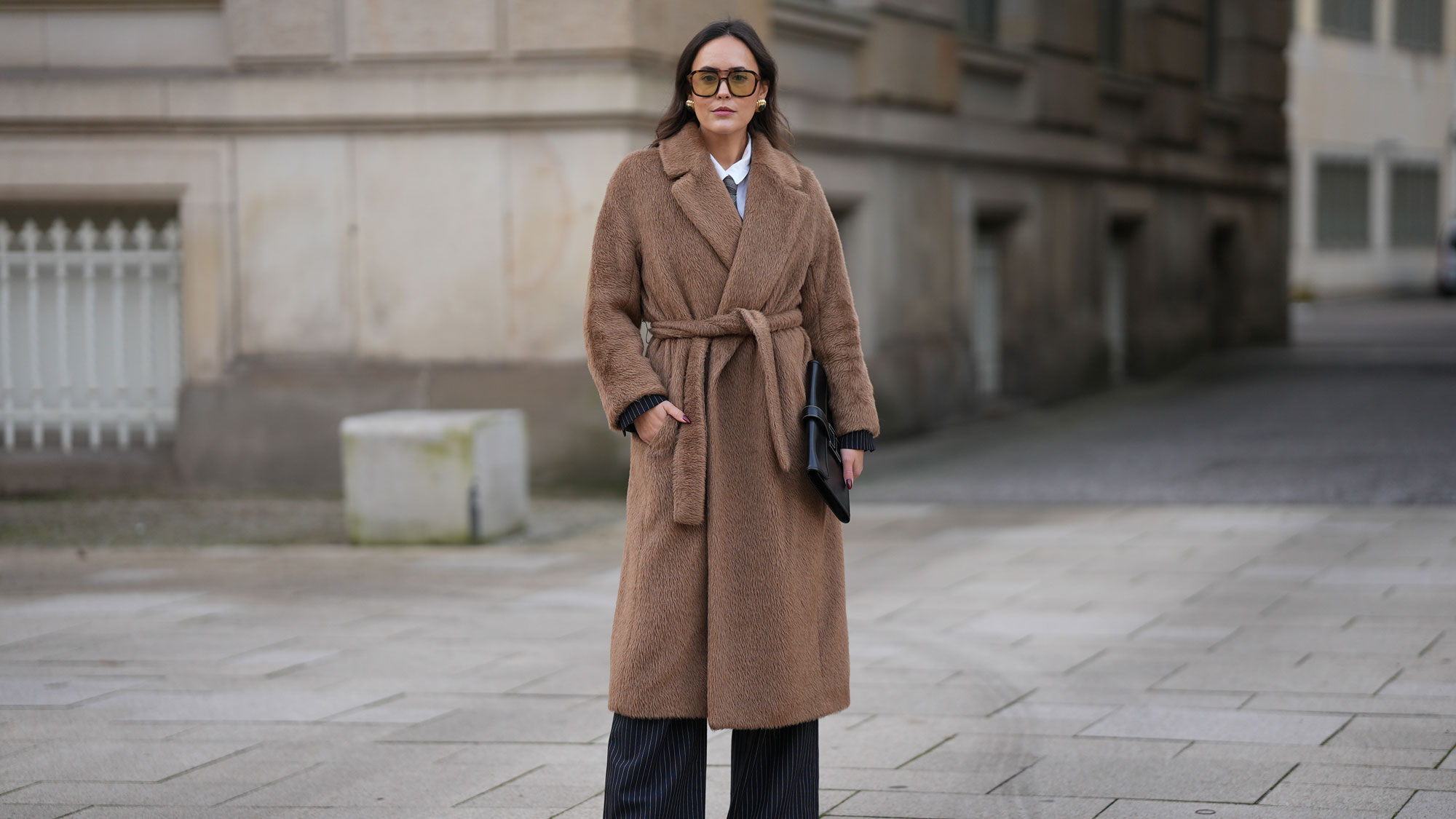  Laura Noltemeyer wears a wrap coat