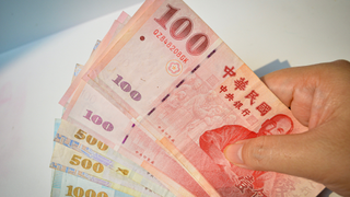 A bundle of New Taiwan Dollar notes.