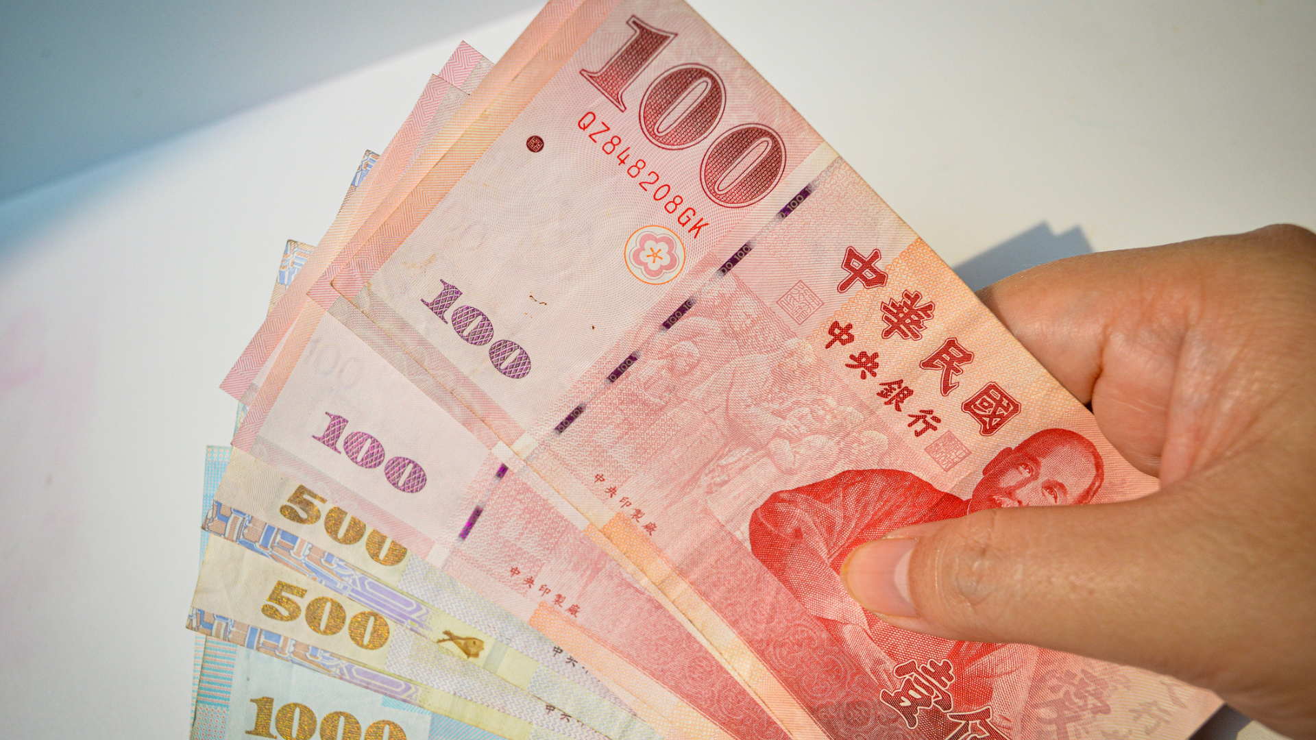 A bundle of New Taiwan Dollar notes. 