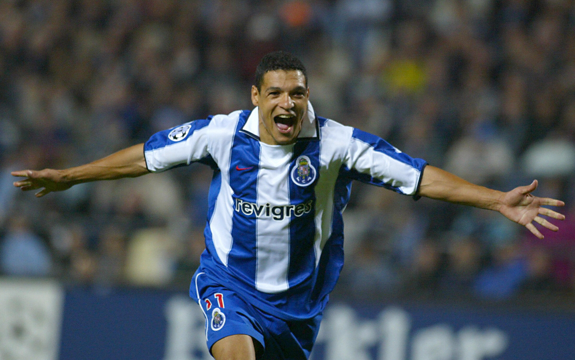 Derlei celebrates a goal for Porto against Marseille in the Champions League in October 2003.