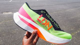 New Balance FuelCell SC Elite v4 London edition running shoe in a person's hand