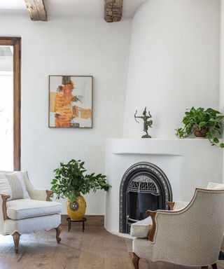 Spanish revival style curved fireplace