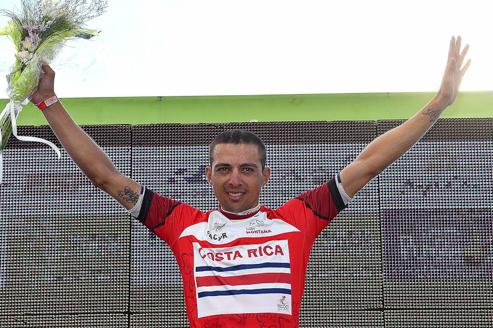 Roman Villalobos in the red climber's jersey.