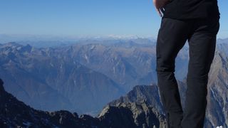 Mountain Equipment Ibex hiking pants on a summit