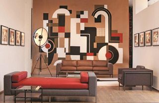 Wall by Tom H John and furniture by Ralph Pucci