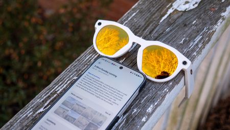 Oakley Meta HSTN AI glasses alongside the Meta AI app, containing a workout summary using data gathered from a Garmin smart watch