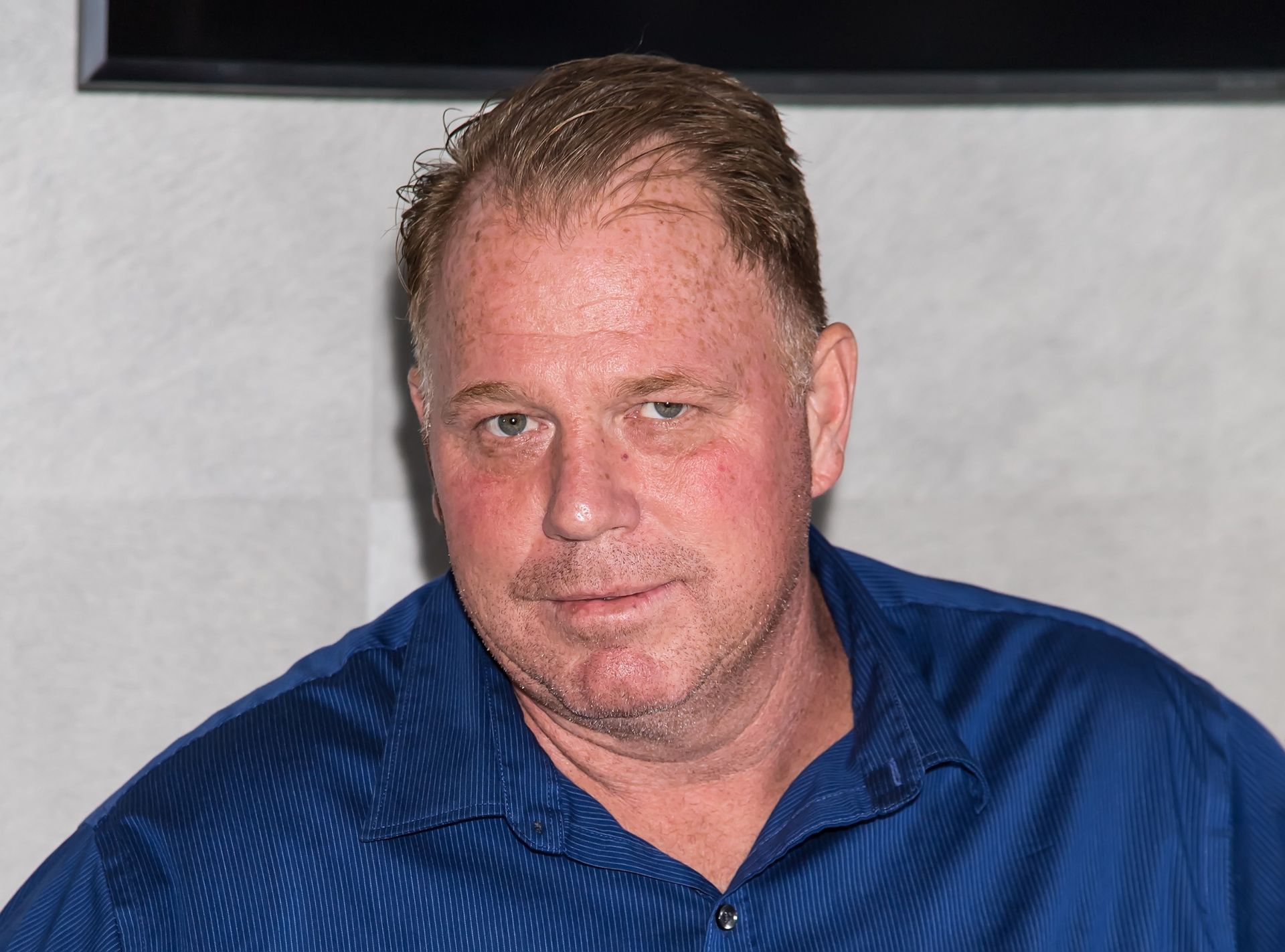 Thomas Markle Jr. in a blue shirt