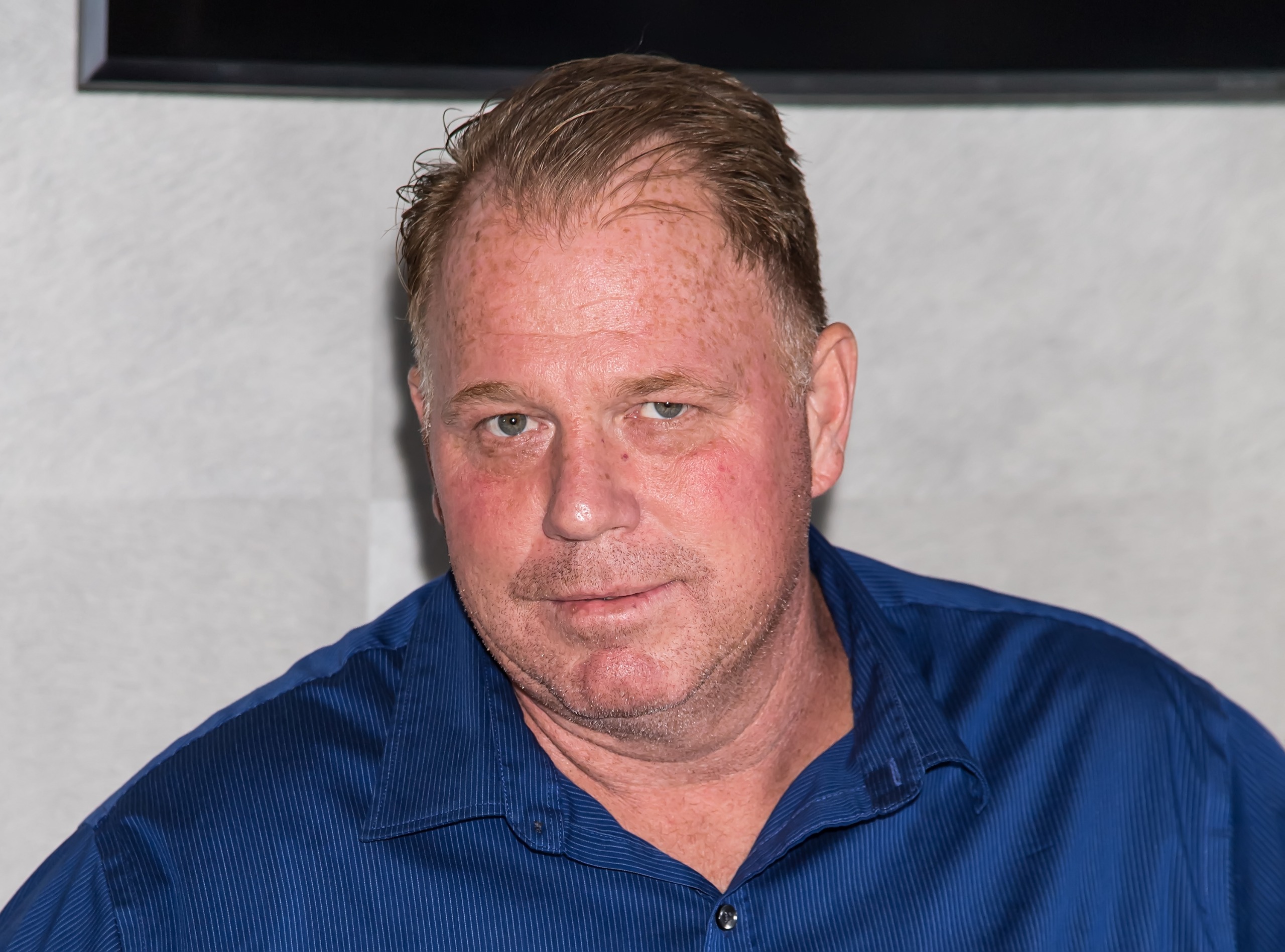 Thomas Markle Jr. in a blue shirt