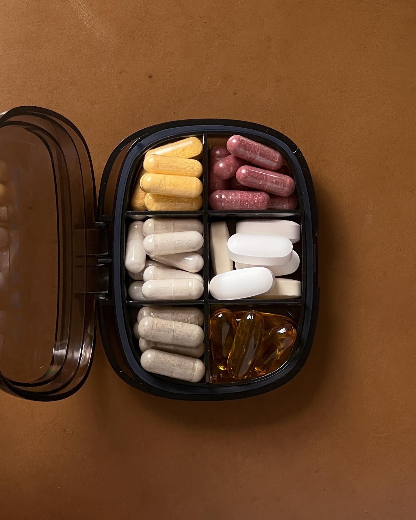 A box full of different vitamins and supplements