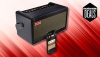 A Positive Grid guitar amp with a smart phone on a red and white background