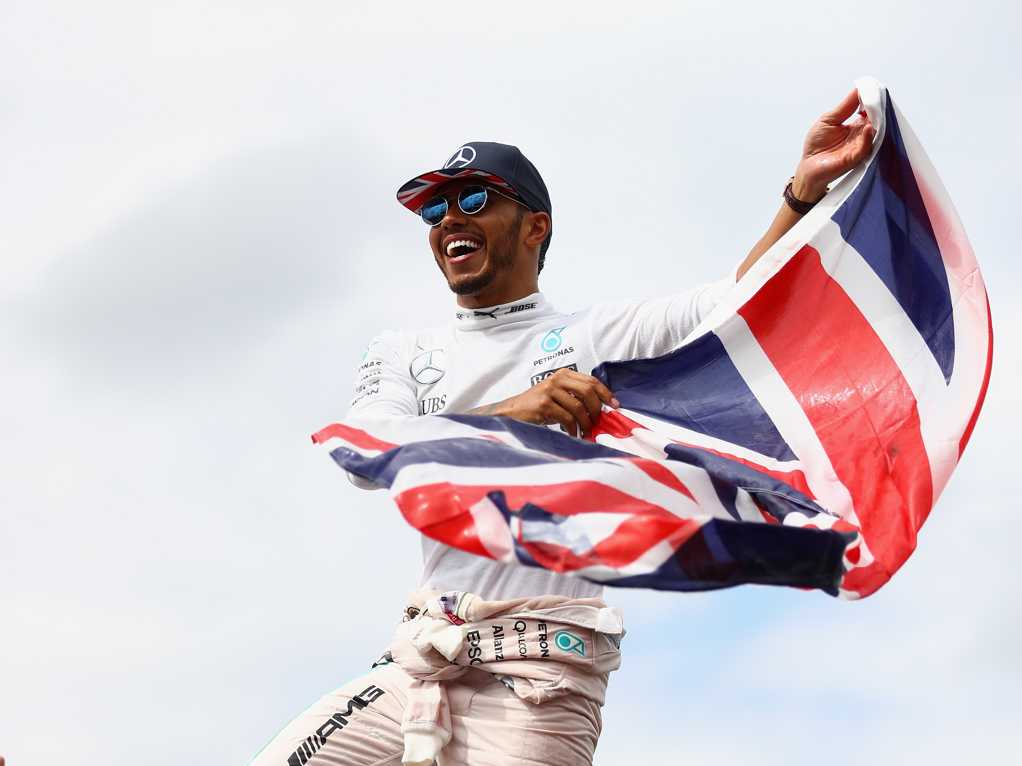Lewis Hamilton celebrates his win on the start finish straight after the 2016 British Grand Prix