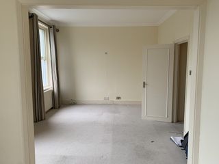 An empty room prior to renovation