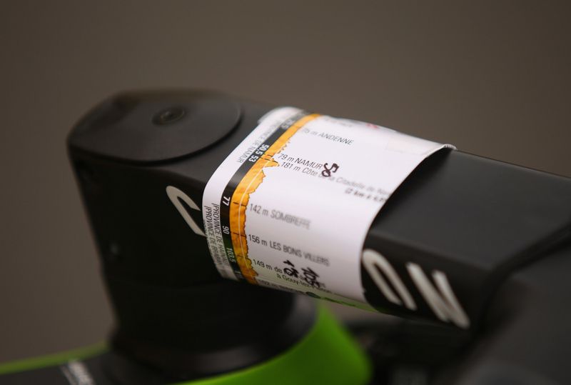 Stage details attached to the stem of a Movistar bike