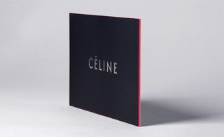Thick black card with a fluorescent pink edge for Celine
