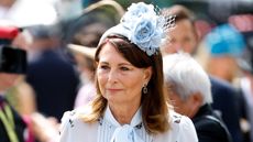 Carole Middleton wearing a powder blue dress attends day two of Royal Ascot 2024 at Ascot Racecourse