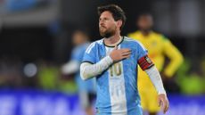 Lionel Messi celebrates after scoring Argentina's third goal against Benin in his final match for the national team