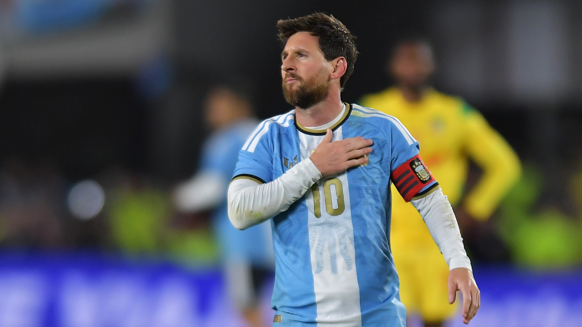 Lionel Messi celebrates after scoring Argentina's third goal against Benin in his final match for the national team