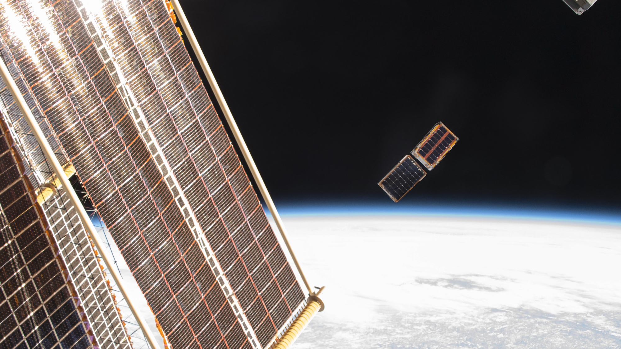 Watch 2 tiny satellites deploy from the ISS in dazzling time-lapse video Space