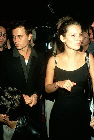PARIS, FRANCE: Johnny Depp and Kate Moss attend a fashion week Party at Les Bains Douches in the 1990s in Paris, France. (Photo by Foc Kan/WireImage)