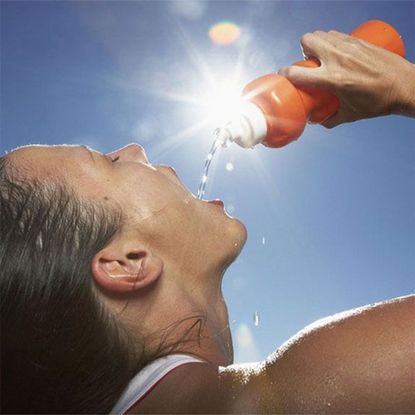 woman with water bottle