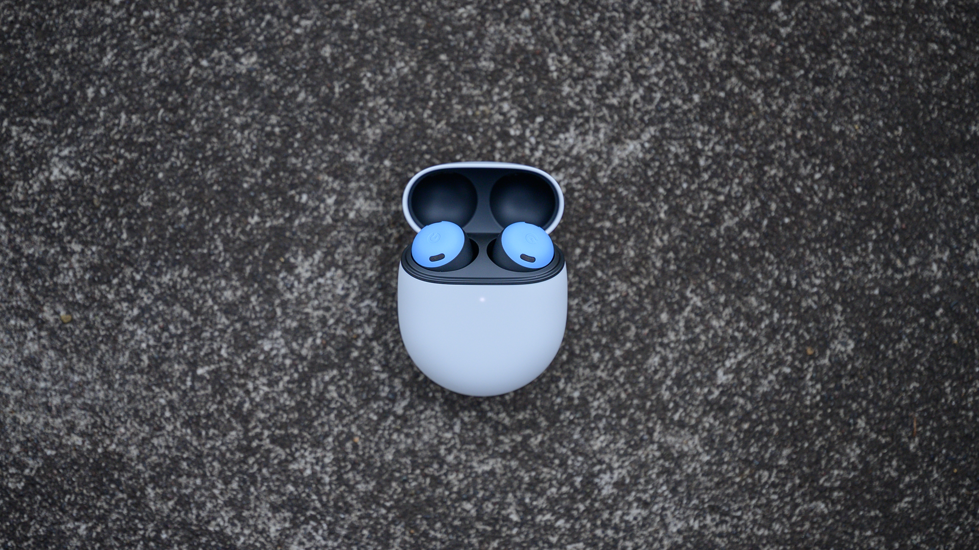 Google Pixel Buds Pro on a stone worktop