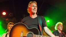 kevin costner playing guitar