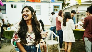 Dealing with loneliness: A woman laughs at a party