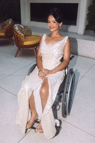 Marissa Bode in her wheelchair wearing a sequin dress ahead of the Wicked los angeles premiere