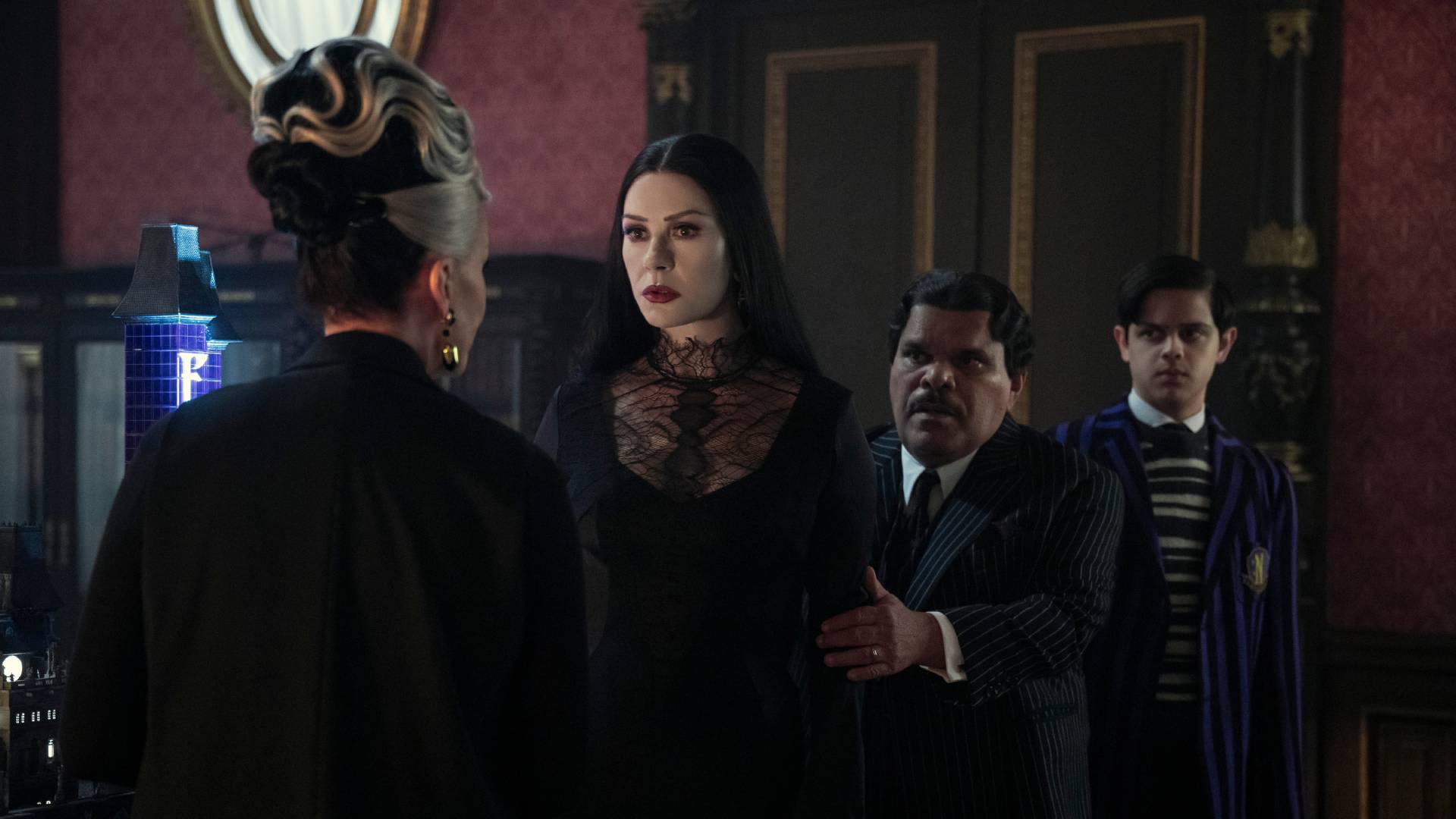 Morticia (Catherine Zeta-Jones), Gomez (Luis Guzm&amp;aacute;n) and Puglsey (Isaac Ordonez) in Wednesday
