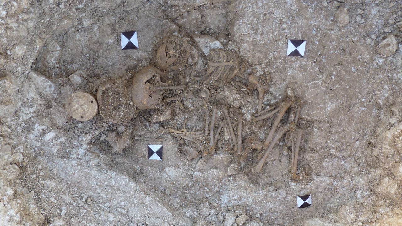 The artifacts were found with the burials of three children. The sculpture was found above the head of the eldest child while the two younger children were found facing each other.