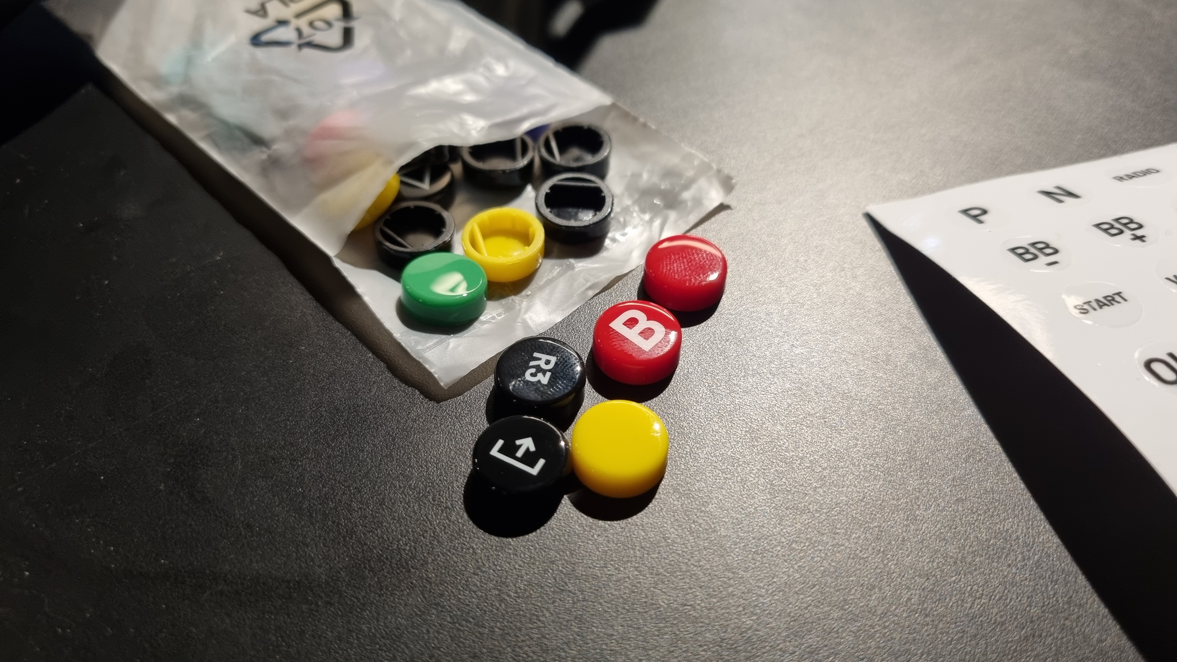 Interchangeable button caps for the Revosim RS Pure wheel rim.