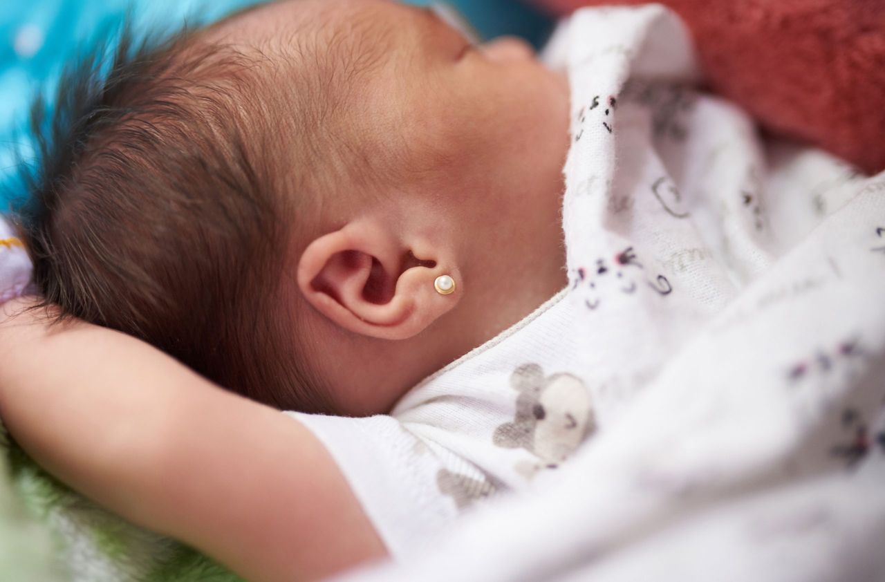 Baby with ears pierced