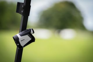 Nikon laser pictured attached to a golf buggy