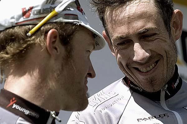 Ben Day (right) shares a joke with Fly V Australia teammate and tour leader Bernard Sulzberger on the podium in Ulverstone.