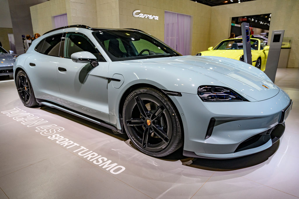 Porsche Taycan 4S Sport Turismu battery electric performance estate car on display at the AutoSalon on January 10, 2025 in Brussels, Belgium